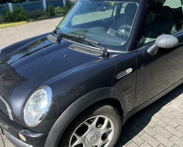 Черный Мини Купер, объемом двигателя 1.6 л и пробегом 265 тыс. км за 4000 $, фото 7 на Automoto.ua