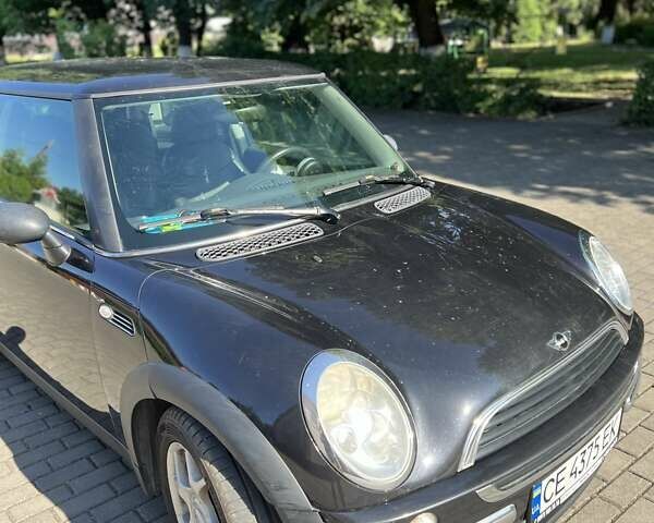 Черный Мини Купер, объемом двигателя 1.6 л и пробегом 265 тыс. км за 4000 $, фото 11 на Automoto.ua