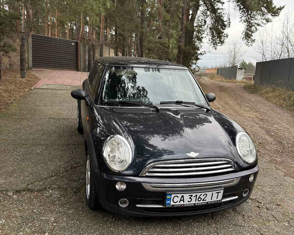 Черный Мини Купер, объемом двигателя 1.6 л и пробегом 208 тыс. км за 4300 $, фото 1 на Automoto.ua