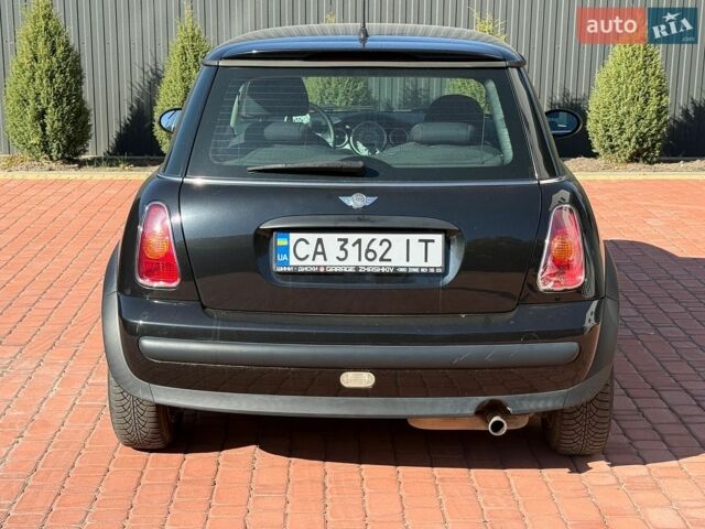 Чорний Міні Cooper, об'ємом двигуна 1.6 л та пробігом 209 тис. км за 4400 $, фото 7 на Automoto.ua