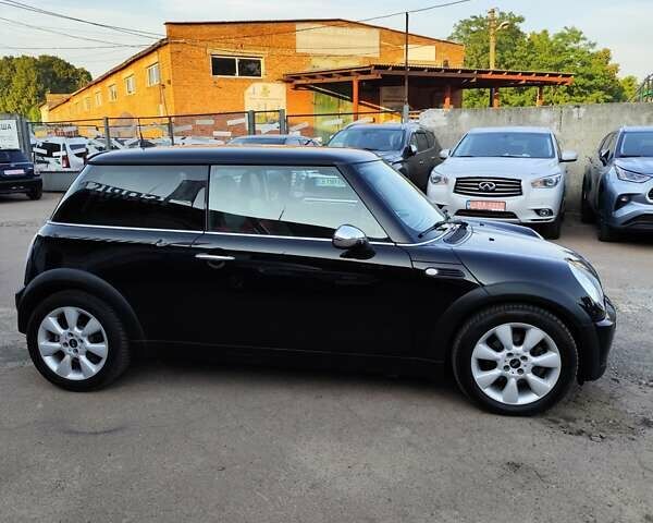 Чорний Міні Cooper, об'ємом двигуна 1.6 л та пробігом 206 тис. км за 5500 $, фото 4 на Automoto.ua