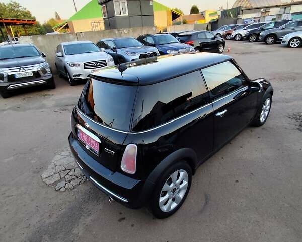 Чорний Міні Cooper, об'ємом двигуна 1.6 л та пробігом 206 тис. км за 5500 $, фото 13 на Automoto.ua