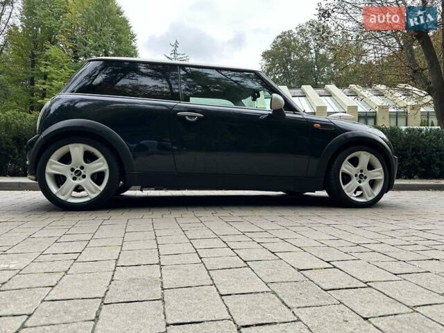 Чорний Міні Cooper, об'ємом двигуна 1.6 л та пробігом 240 тис. км за 5300 $, фото 12 на Automoto.ua