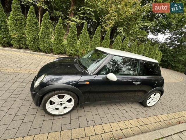 Чорний Міні Cooper, об'ємом двигуна 1.6 л та пробігом 240 тис. км за 5300 $, фото 14 на Automoto.ua