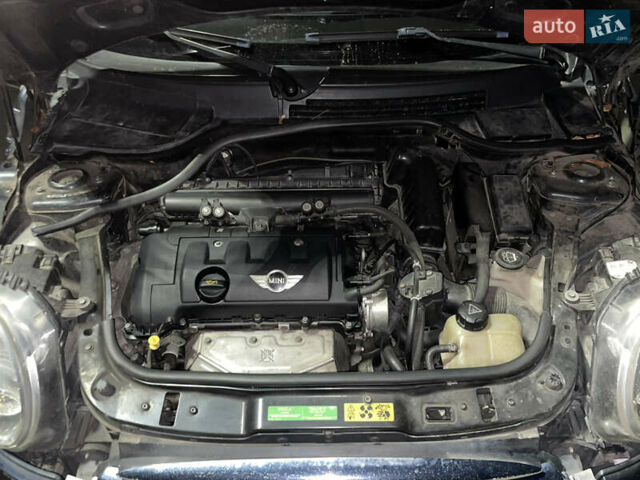 Черный Мини Купер, объемом двигателя 1.6 л и пробегом 270 тыс. км за 6899 $, фото 14 на Automoto.ua