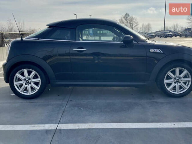 Черный Мини Купер, объемом двигателя 2 л и пробегом 222 тыс. км за 9966 $, фото 4 на Automoto.ua