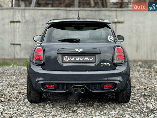 Черный Мини Купер, объемом двигателя 2 л и пробегом 155 тыс. км за 13490 $, фото 7 на Automoto.ua