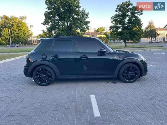 Чорний Міні Cooper, об'ємом двигуна 2 л та пробігом 92 тис. км за 11800 $, фото 2 на Automoto.ua