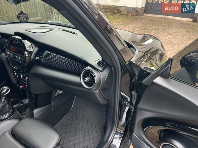 Чорний Міні Cooper, об'ємом двигуна 2 л та пробігом 177 тис. км за 11900 $, фото 76 на Automoto.ua