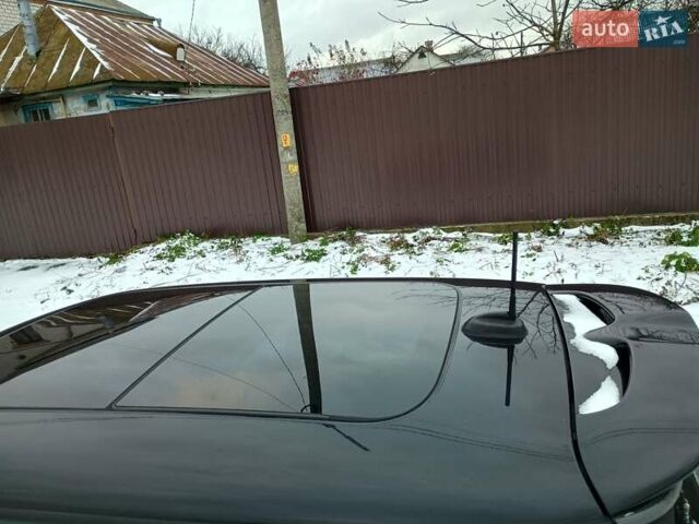 Черный Мини Купер, объемом двигателя 2 л и пробегом 128 тыс. км за 15700 $, фото 5 на Automoto.ua