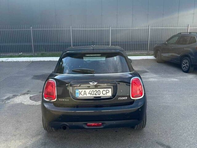 Черный Мини Купер, объемом двигателя 1.5 л и пробегом 129 тыс. км за 12600 $, фото 1 на Automoto.ua