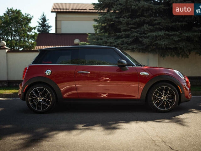 Червоний Міні Cooper, об'ємом двигуна 2 л та пробігом 94 тис. км за 14900 $, фото 1 на Automoto.ua