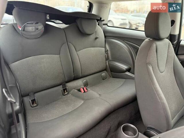 Зелений Міні Cooper, об'ємом двигуна 1.4 л та пробігом 195 тис. км за 6990 $, фото 11 на Automoto.ua