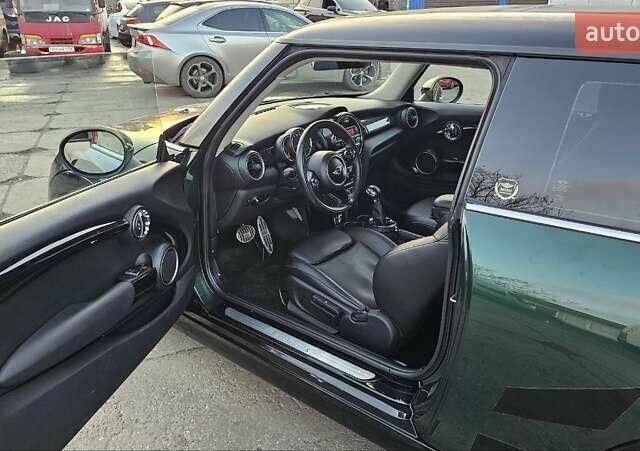 Зелений Міні Cooper, об'ємом двигуна 2 л та пробігом 98 тис. км за 14100 $, фото 18 на Automoto.ua