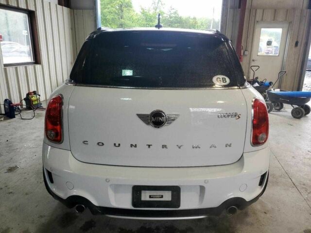 Белый Мини Кантримен, объемом двигателя 1.6 л и пробегом 102 тыс. км за 2000 $, фото 10 на Automoto.ua