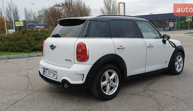 Белый Мини Кантримен, объемом двигателя 1.6 л и пробегом 209 тыс. км за 10400 $, фото 4 на Automoto.ua