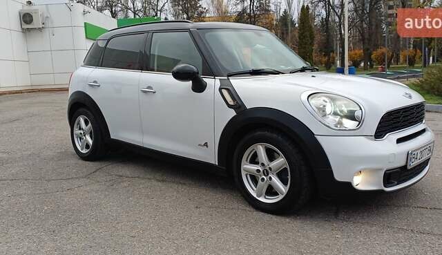 Белый Мини Кантримен, объемом двигателя 1.6 л и пробегом 209 тыс. км за 10400 $, фото 3 на Automoto.ua