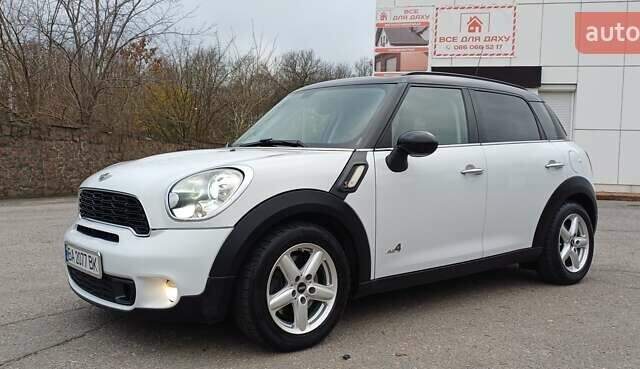 Белый Мини Кантримен, объемом двигателя 1.6 л и пробегом 209 тыс. км за 10400 $, фото 1 на Automoto.ua