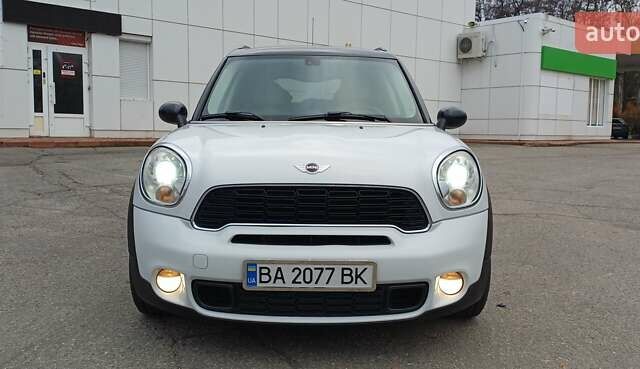 Белый Мини Кантримен, объемом двигателя 1.6 л и пробегом 209 тыс. км за 10400 $, фото 2 на Automoto.ua