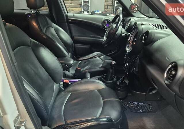 Белый Мини Кантримен, объемом двигателя 1.6 л и пробегом 176 тыс. км за 12500 $, фото 10 на Automoto.ua