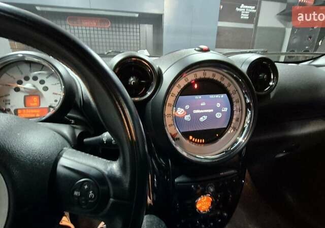 Белый Мини Кантримен, объемом двигателя 1.6 л и пробегом 176 тыс. км за 12500 $, фото 4 на Automoto.ua