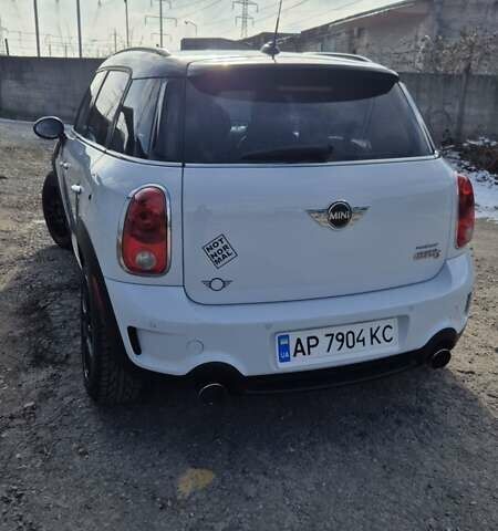 Белый Мини Кантримен, объемом двигателя 1.6 л и пробегом 176 тыс. км за 12500 $, фото 3 на Automoto.ua