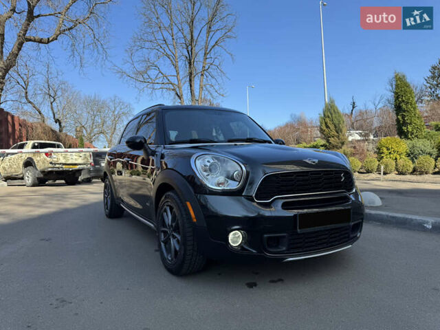 Черный Мини Кантримен, объемом двигателя 1.6 л и пробегом 143 тыс. км за 11900 $, фото 1 на Automoto.ua