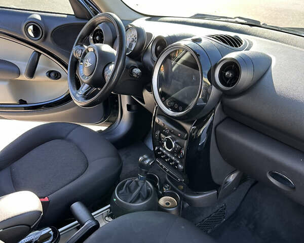 Зелений Міні Кантрімен, об'ємом двигуна 2 л та пробігом 99 тис. км за 11999 $, фото 12 на Automoto.ua