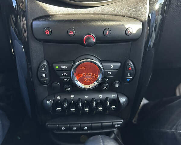 Зелений Міні Кантрімен, об'ємом двигуна 2 л та пробігом 99 тис. км за 11999 $, фото 18 на Automoto.ua