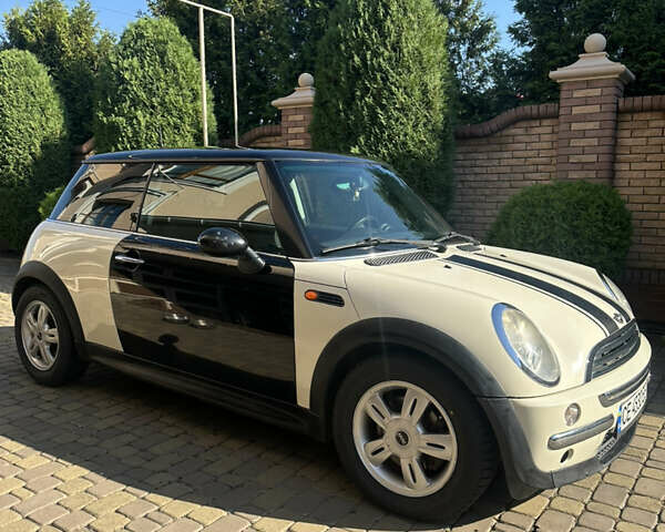 Белый Мини Hatch, объемом двигателя 1.4 л и пробегом 250 тыс. км за 4300 $, фото 1 на Automoto.ua