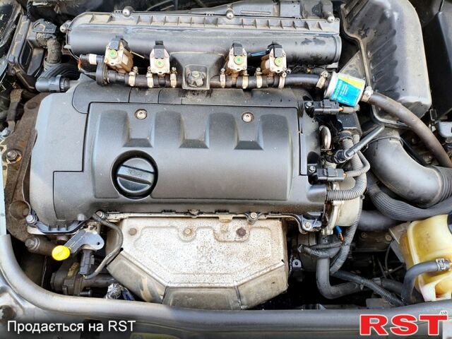 Черный Мини Hatch, объемом двигателя 1.6 л и пробегом 227 тыс. км за 4300 $, фото 6 на Automoto.ua