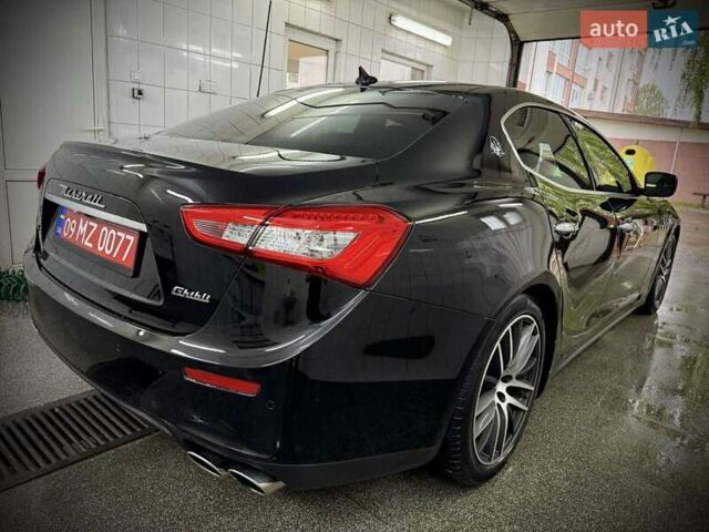 Черный Мазерати Гибли, объемом двигателя 2.98 л и пробегом 91 тыс. км за 24950 $, фото 10 на Automoto.ua