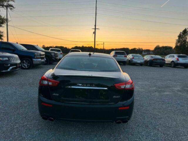 Черный Мазерати Гибли, объемом двигателя 3 л и пробегом 65 тыс. км за 12700 $, фото 6 на Automoto.ua