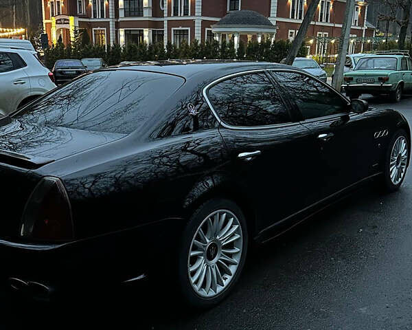 Черный Мазерати Кватропорте, объемом двигателя 4.24 л и пробегом 88 тыс. км за 13300 $, фото 6 на Automoto.ua