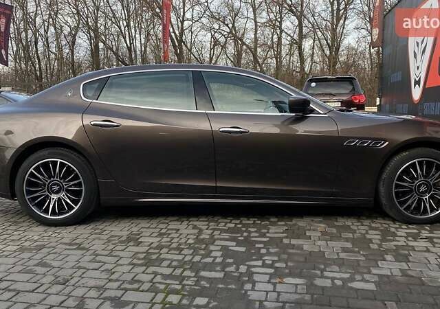 Коричневый Мазерати Кватропорте, объемом двигателя 2.98 л и пробегом 77 тыс. км за 25700 $, фото 8 на Automoto.ua