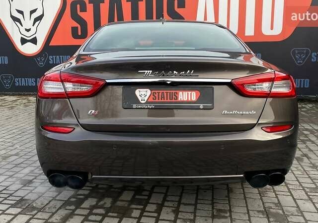 Коричневый Мазерати Кватропорте, объемом двигателя 2.98 л и пробегом 77 тыс. км за 25700 $, фото 5 на Automoto.ua