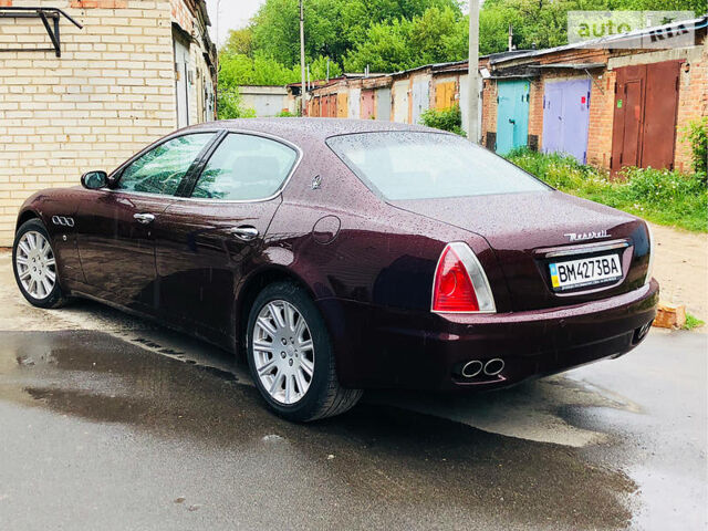 Червоний Мазераті Quattroporte, об'ємом двигуна 4.2 л та пробігом 48 тис. км за 18900 $, фото 39 на Automoto.ua