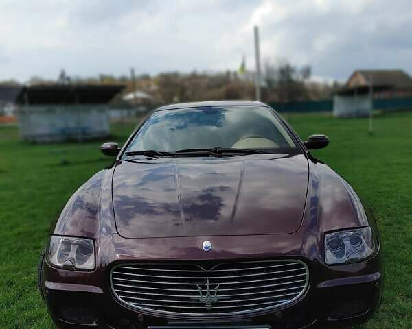 Червоний Мазераті Quattroporte, об'ємом двигуна 4.2 л та пробігом 116 тис. км за 12500 $, фото 5 на Automoto.ua