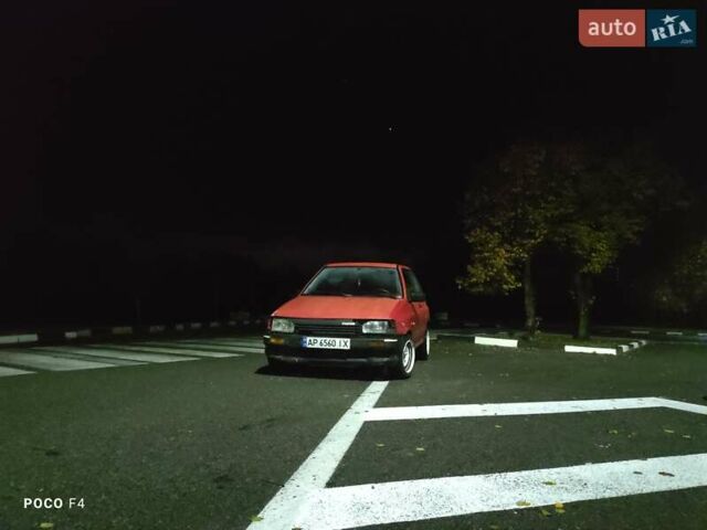 Красный Мазда 121, объемом двигателя 1.3 л и пробегом 290 тыс. км за 850 $, фото 2 на Automoto.ua