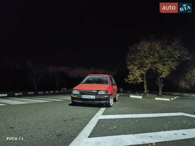 Красный Мазда 121, объемом двигателя 1.3 л и пробегом 290 тыс. км за 850 $, фото 1 на Automoto.ua