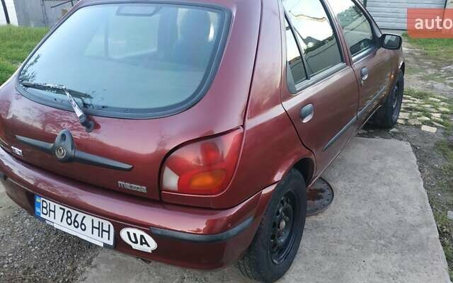 Красный Мазда 121, объемом двигателя 1.3 л и пробегом 185 тыс. км за 1850 $, фото 6 на Automoto.ua