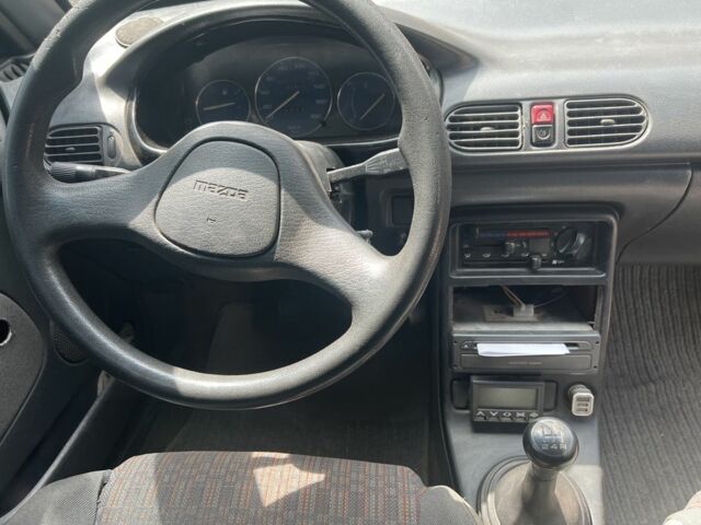 Красный Мазда 121, объемом двигателя 1.3 л и пробегом 333 тыс. км за 1650 $, фото 6 на Automoto.ua