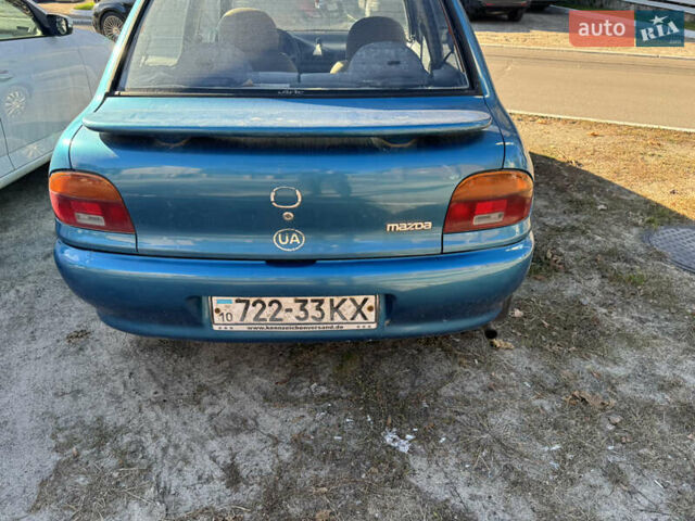 Мазда 121, объемом двигателя 1.3 л и пробегом 265 тыс. км за 850 $, фото 3 на Automoto.ua