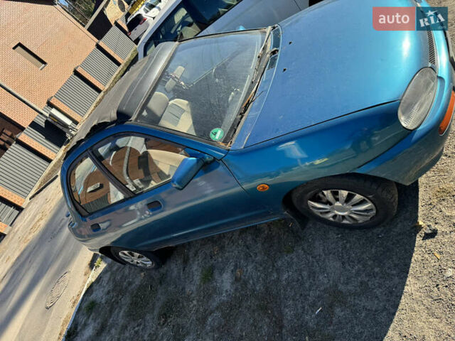 Мазда 121, объемом двигателя 1.3 л и пробегом 265 тыс. км за 850 $, фото 1 на Automoto.ua