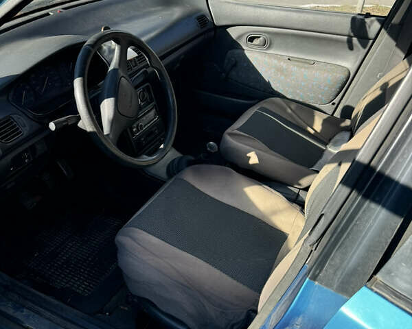 Мазда 121, объемом двигателя 1.3 л и пробегом 265 тыс. км за 850 $, фото 5 на Automoto.ua