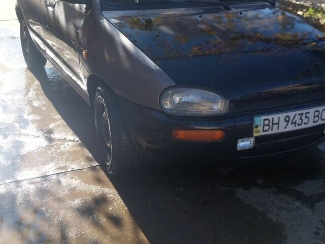 Серый Мазда 121, объемом двигателя 0 л и пробегом 250 тыс. км за 1700 $, фото 3 на Automoto.ua