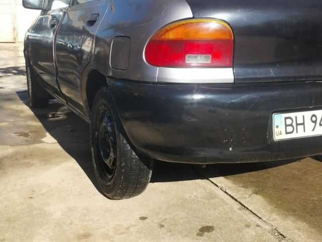 Серый Мазда 121, объемом двигателя 0 л и пробегом 250 тыс. км за 1700 $, фото 6 на Automoto.ua