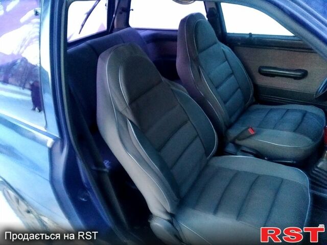 Синій Мазда 121, об'ємом двигуна 1.3 л та пробігом 152 тис. км за 1450 $, фото 7 на Automoto.ua