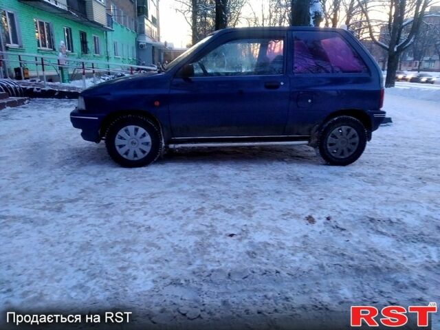 Синій Мазда 121, об'ємом двигуна 1.3 л та пробігом 152 тис. км за 1450 $, фото 1 на Automoto.ua