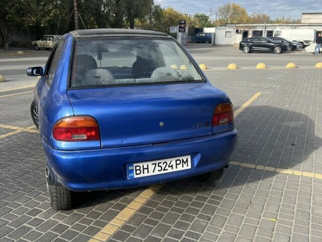 Синій Мазда 121, об'ємом двигуна 1.3 л та пробігом 347 тис. км за 999 $, фото 2 на Automoto.ua